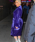 84039118_christina-aguilera-was-seen-wearing-a-purple-robe-as-she-arrived-at-radio-city.jpg