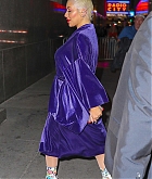 84039124_christina-aguilera-was-seen-wearing-a-purple-robe-as-she-arrived-at-radio-city.jpg